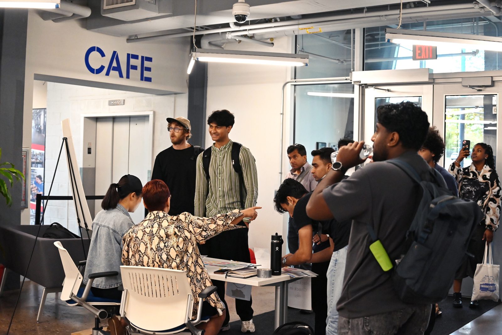 Participants checking in at the hackathon